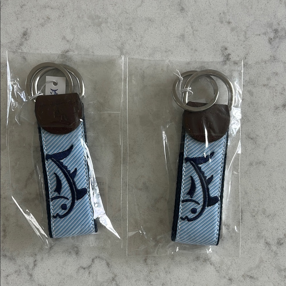 New in package. 2 Southern Tide Keychains. Key fob. Skip jack logo. One size.